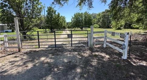 GATE AT ENTRANCE OF LAND