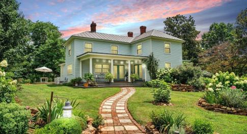 Welcome home to this completely restored historic property, nestled on land once part of a 2000-acre orchard and farm.  Meandering to the rocking chair front porch, a path of hand-gathered fieldstones adds timeless character and connection to it's rich past!