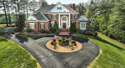 Welcome to 107 Emory Way situated at the front entrance of Poplar Grove Golf Course!! 1.71 acres on the 6th and 7th hole of this beautiful Sam Snead course!