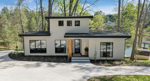 THIS PROPERTY IS ON COUNTY SEWER AT THE LAKE!  This contemporary new construction lake front home is located at one of the most convenient locations on the lake! Only minutes to Bridgewater offering marina, shopping, dining, live music, coffee shop, ice cream, mini golf, and more!