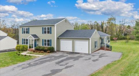 Two story home with a large addition with an apartment allowing for multi-generational living
